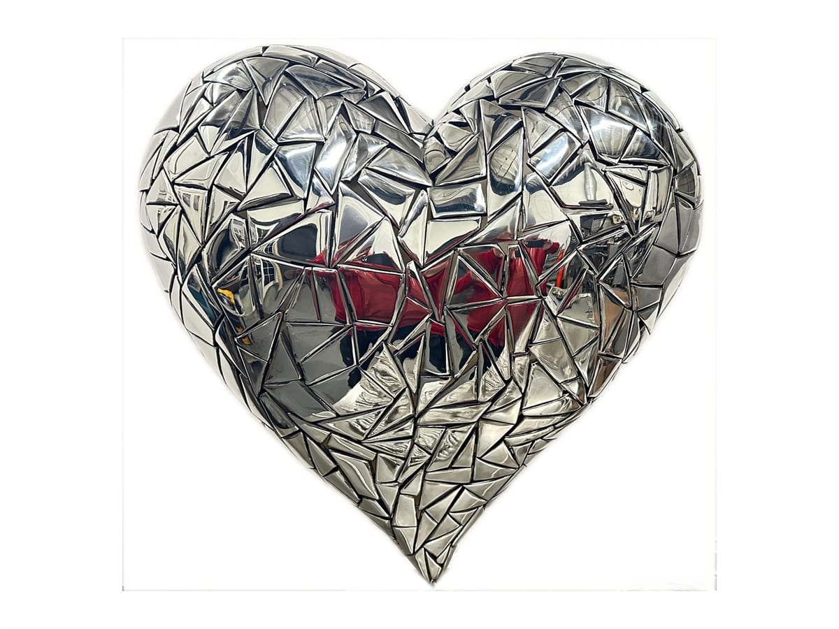 A heart built up from hundreds of small mirrored steel plates